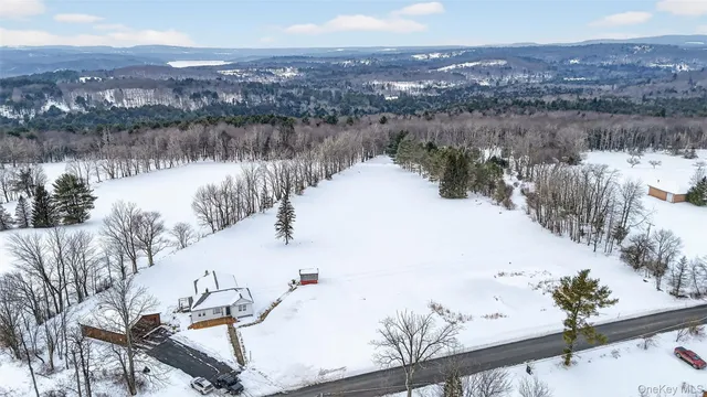 a view of swimming pool with lake view and mountain view