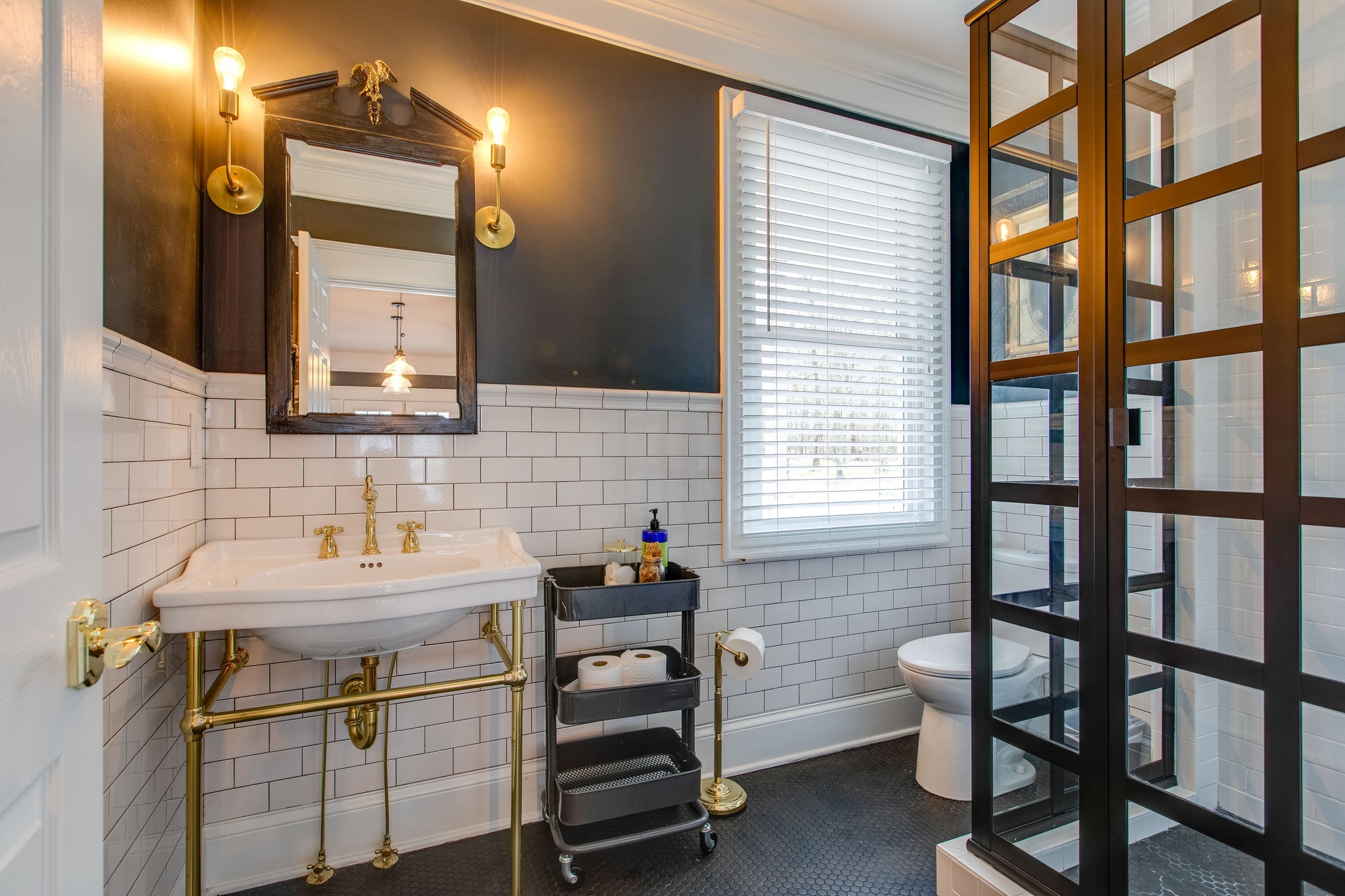 4280 Warren Road Franklin, TN 37067 - Photo 28 of 50 a bathroom with a sink toilet and mirror