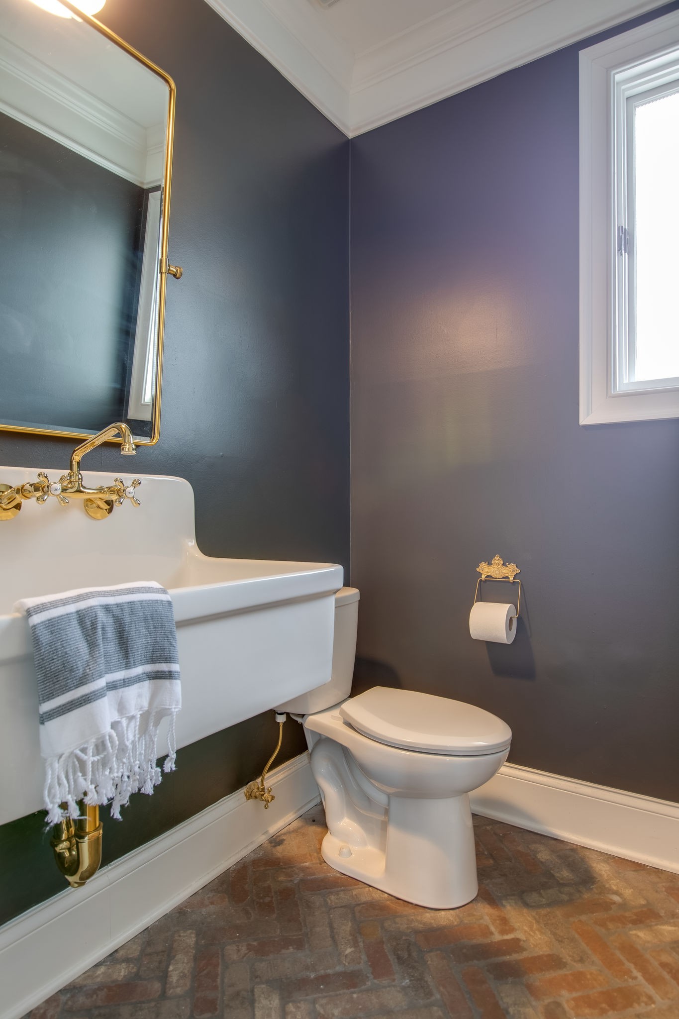 4280 Warren Road Franklin, TN 37067 - Photo 32 of 50 a bathroom with a toilet and a mirror