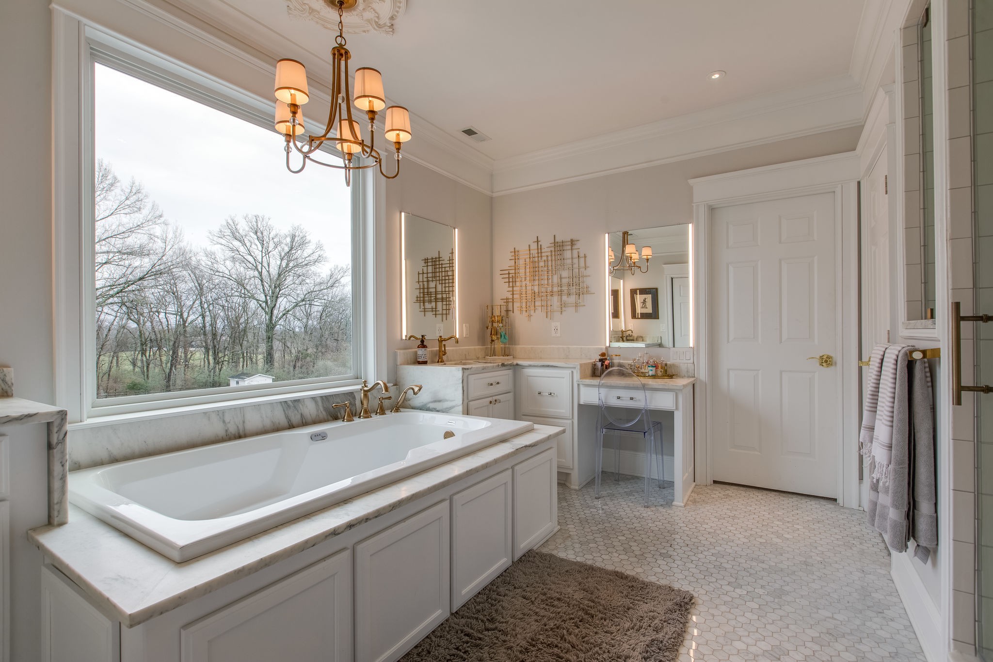 4280 Warren Road Franklin, TN 37067 - Photo 35 of 50 a spacious bathroom with a tub a sink and mirror