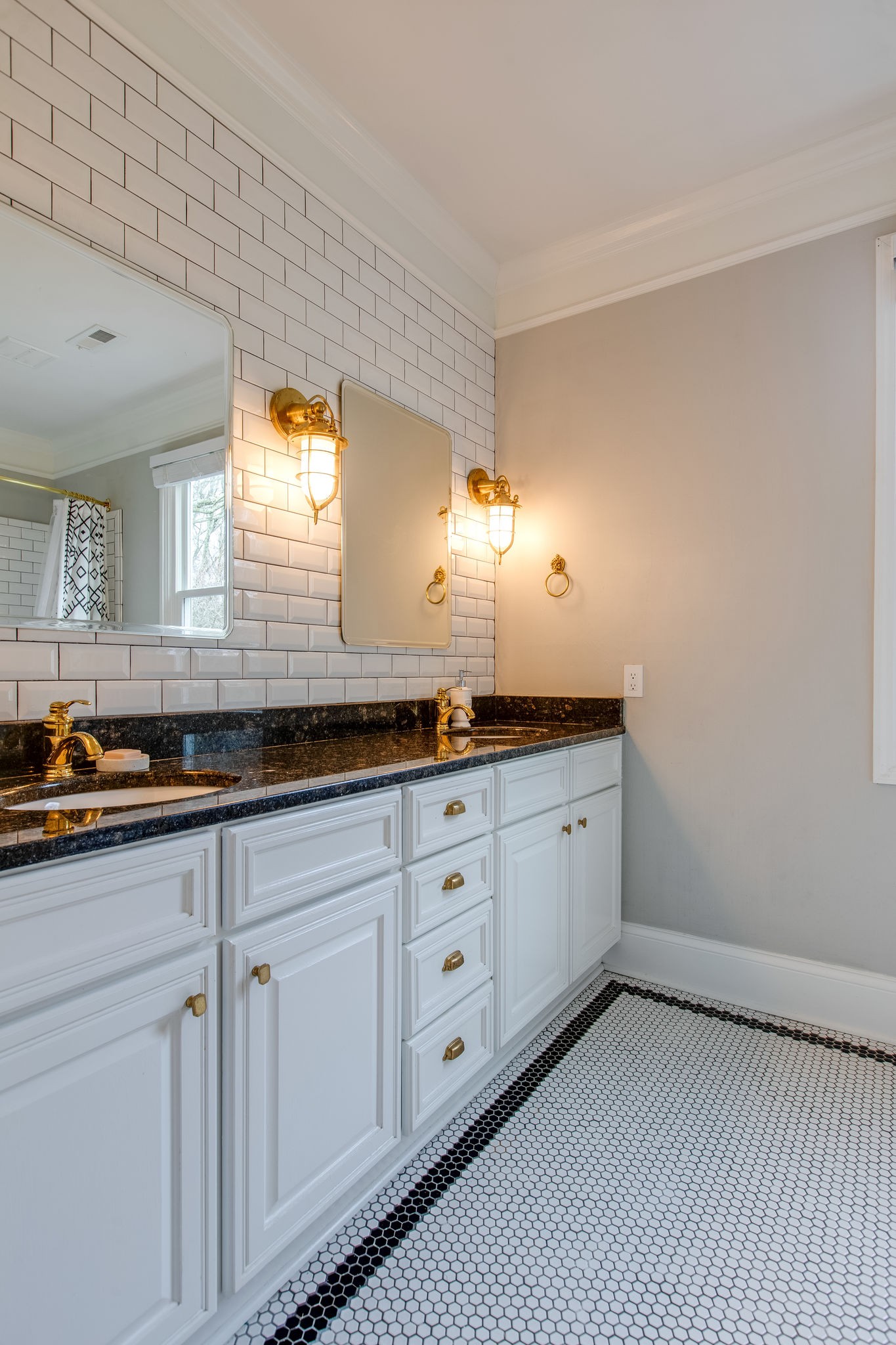 4280 Warren Road Franklin, TN 37067 - Photo 39 of 50 a kitchen with granite countertop white cabinets and a sink