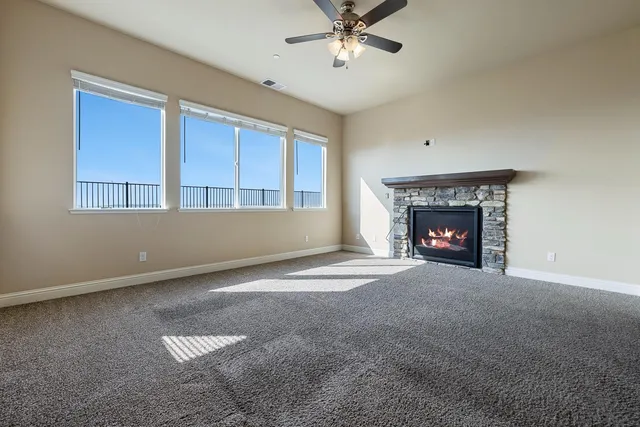 a white toilet sitting next to a bath tub