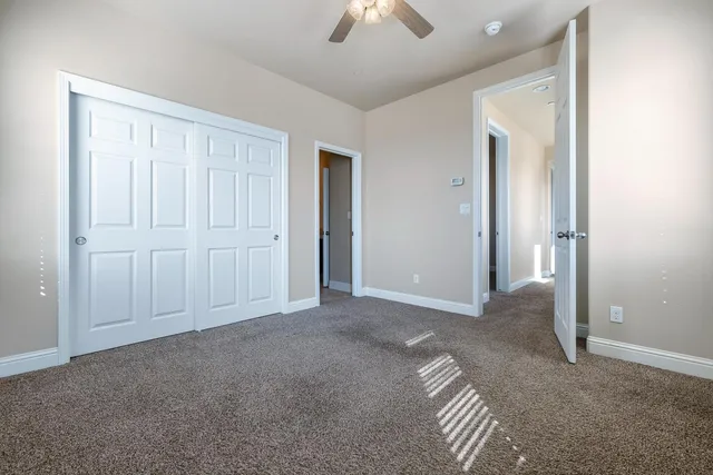 an aerial view of a house with a garden