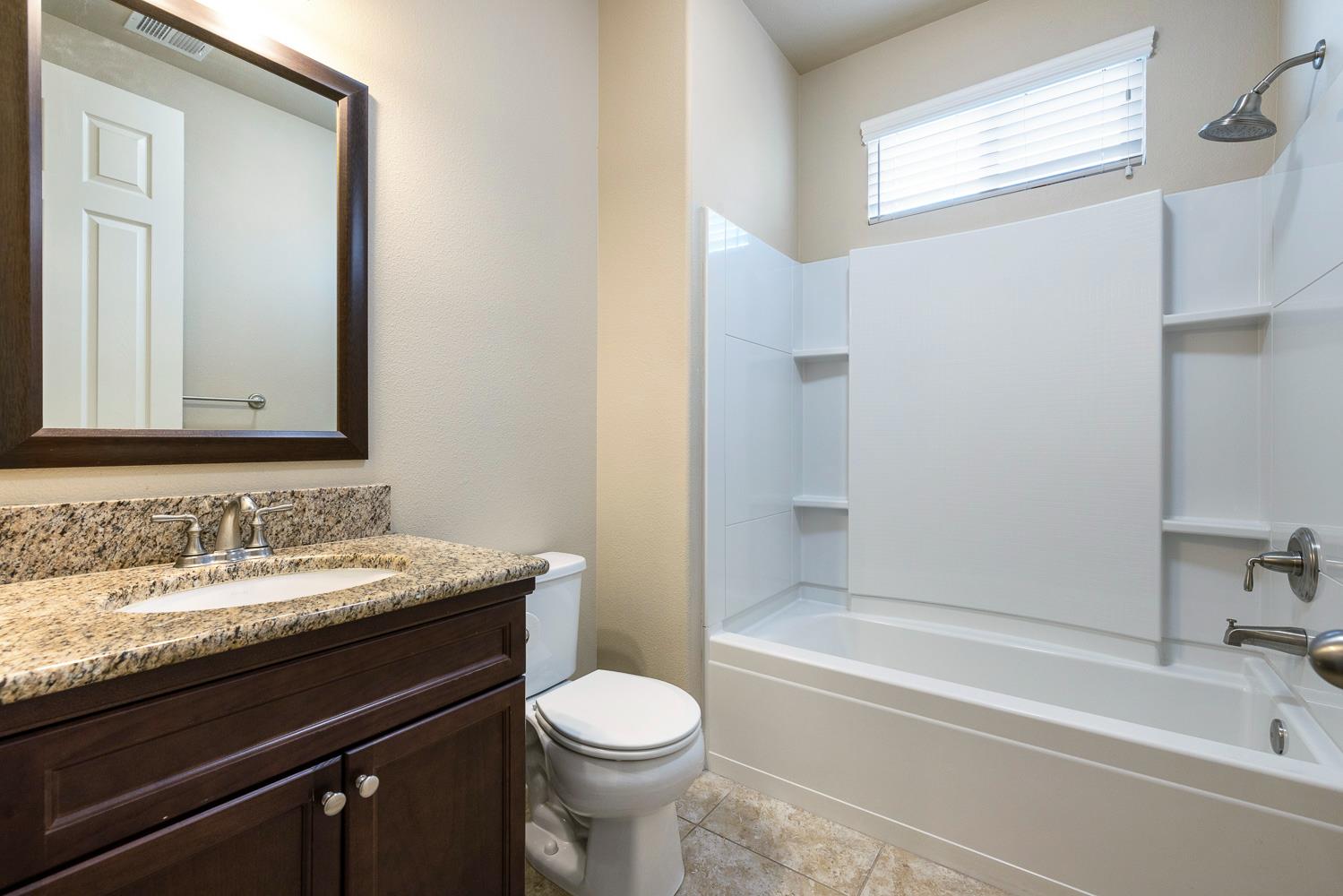 18978 Via Bellagio Friant, CA 93626 - Photo 58 of 85 Downstairs bathroom 1