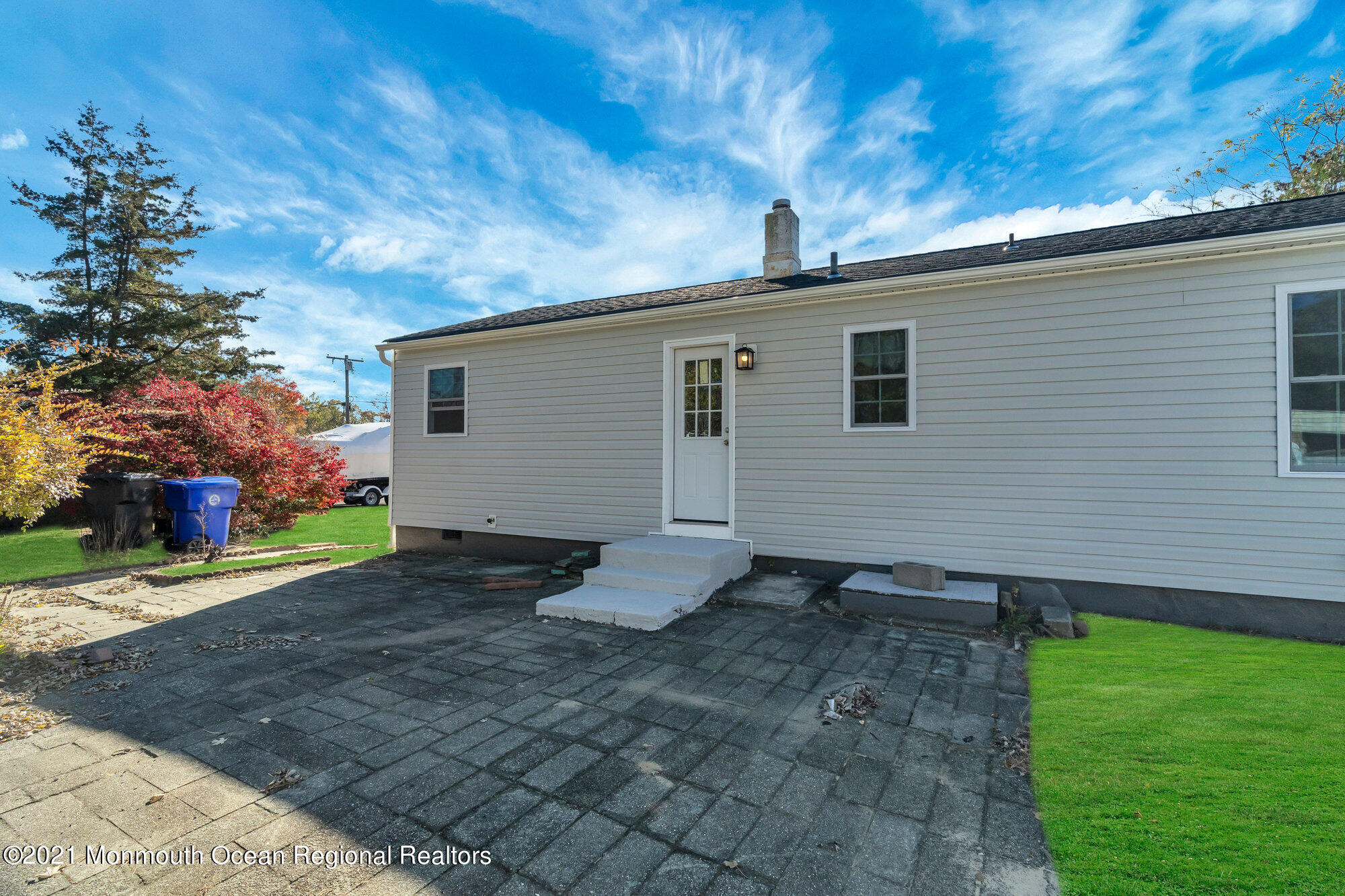 318 Bellanca Road Brick, NJ 08723 - Photo 20 of 23 a view of a backyard with plants and large tree