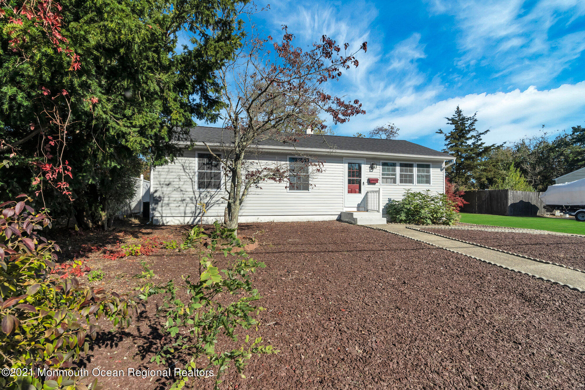 318 Bellanca Road Brick, NJ 08723 - Photo 5 of 23 a front view of a house with a yard