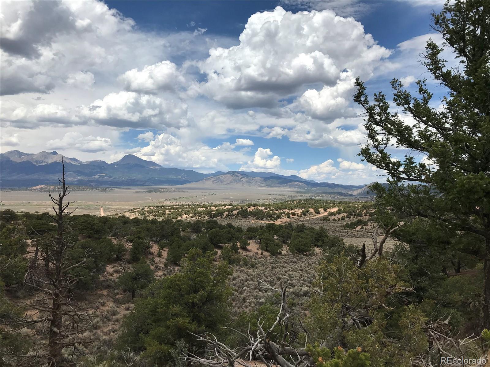 111 Mitchell Road Fort Garland, CO 81133 - Photo 5 of 23 a view of a city of mountains in the background