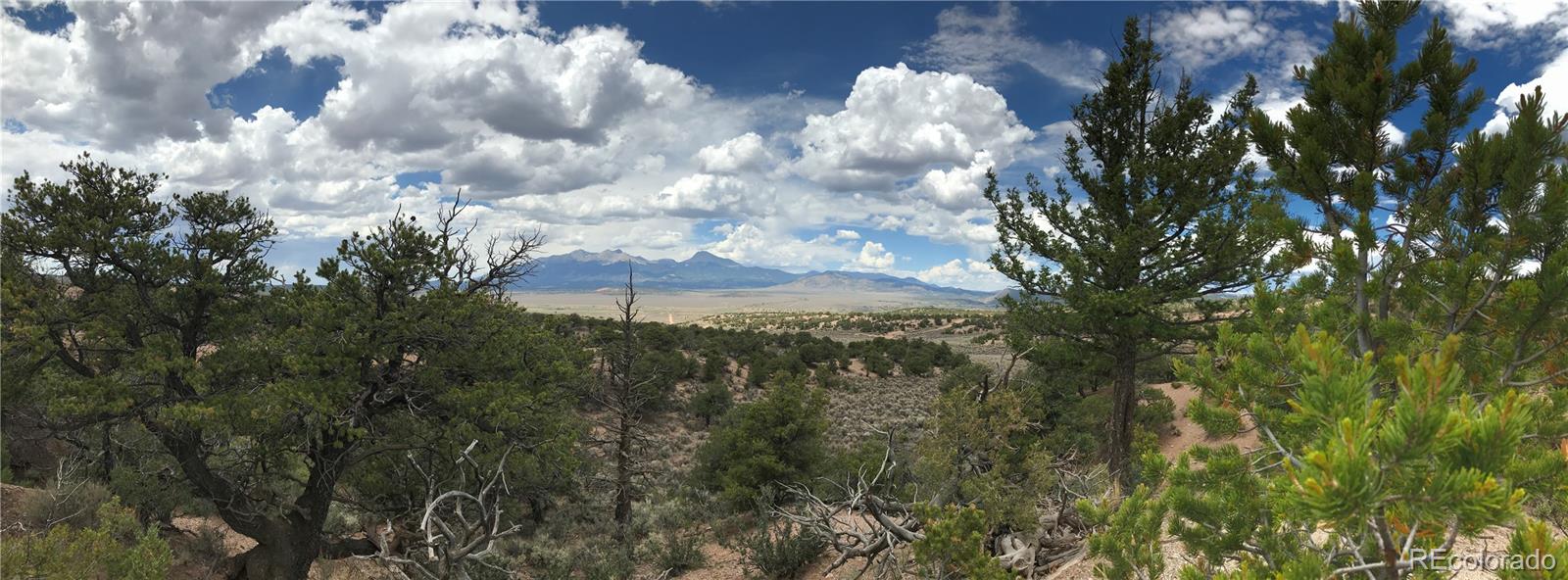 111 Mitchell Road Fort Garland, CO 81133 - Photo 7 of 23 a view of a building in middle of forest