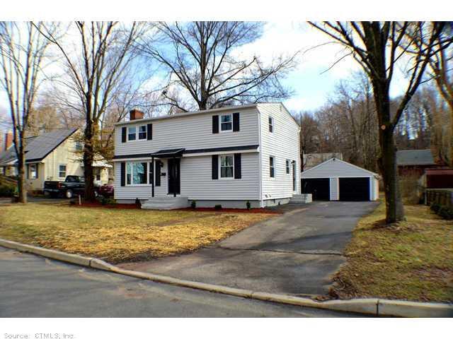 a view of a yard in front of a house
