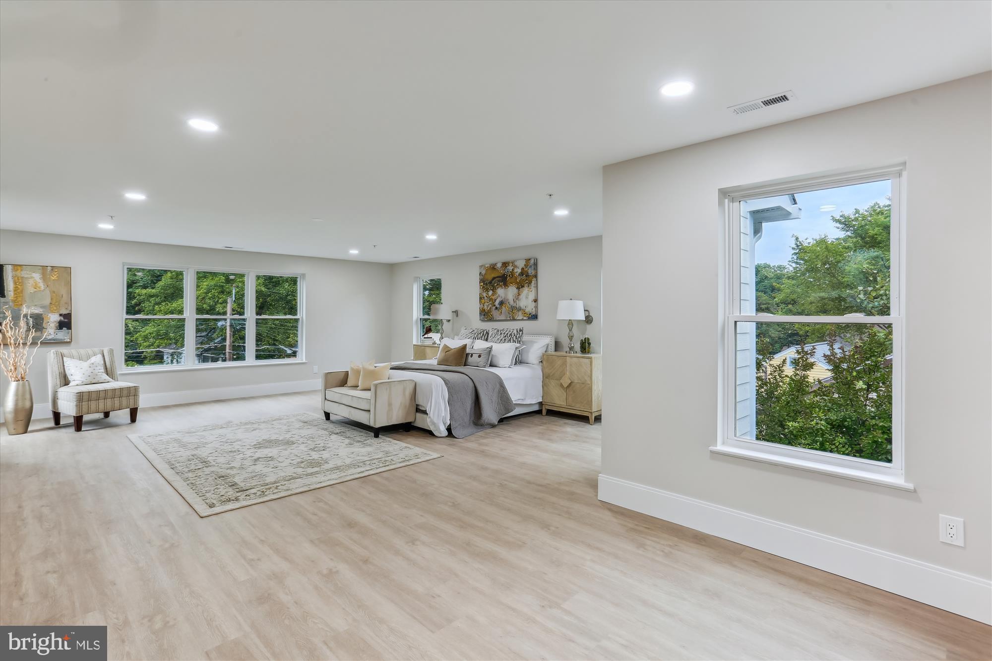 620 Mississippi Avenue Silver Spring, MD 20910 - Photo 27 of 50 a bedroom with a large bed and a large window