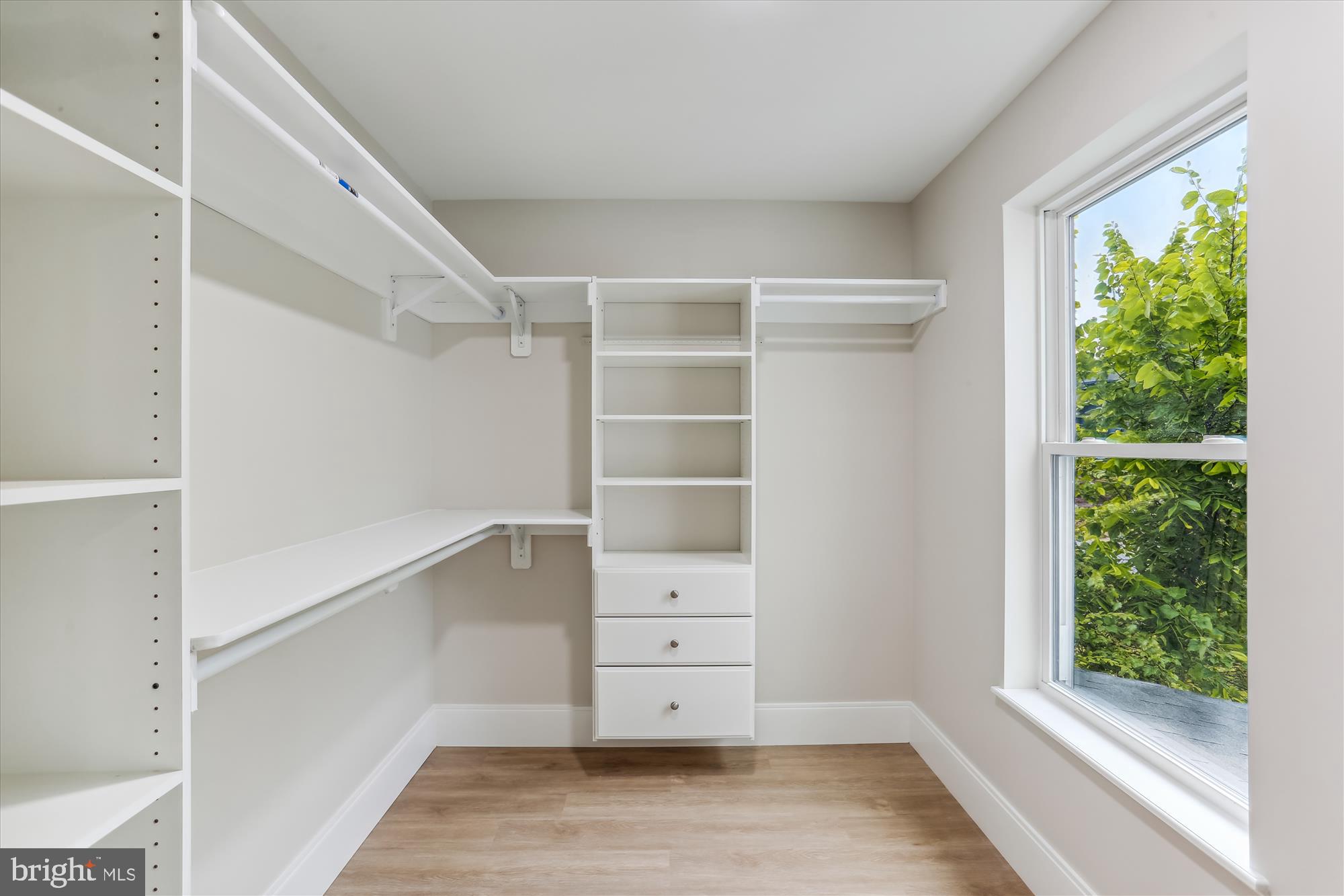 620 Mississippi Avenue Silver Spring, MD 20910 - Photo 28 of 50 a view of walk in closet with empty racks