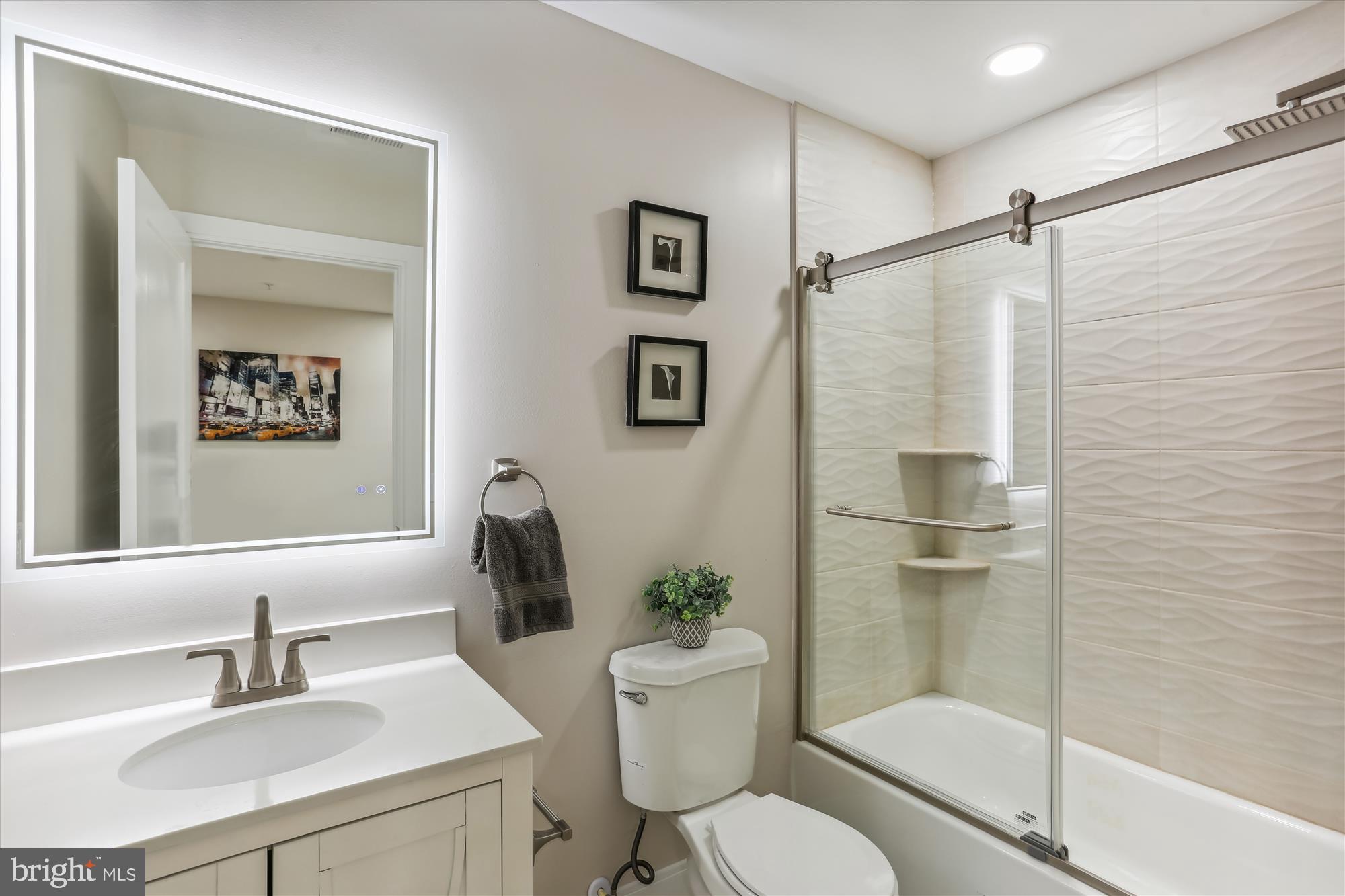 620 Mississippi Avenue Silver Spring, MD 20910 - Photo 35 of 50 a bathroom with a sink toilet and shower