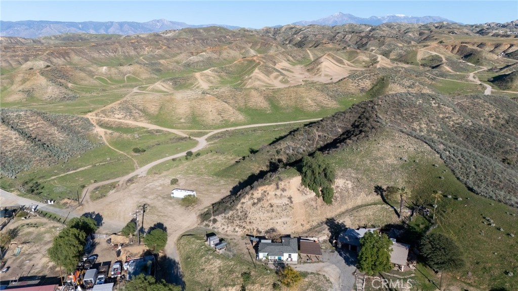 0 Reche Canyon Road Colton, CA 92324 - Photo 3 of 7 an aerial view of a house with a mountain