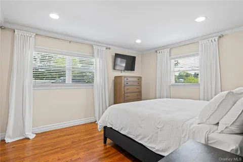 a view of a hallway with windows