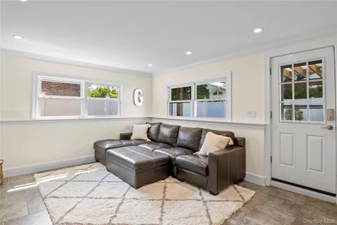 a bedroom with a bed and a book shelf
