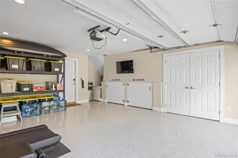 a utility room with washer and dryer