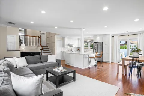 a view of a house with a yard porch and sitting area