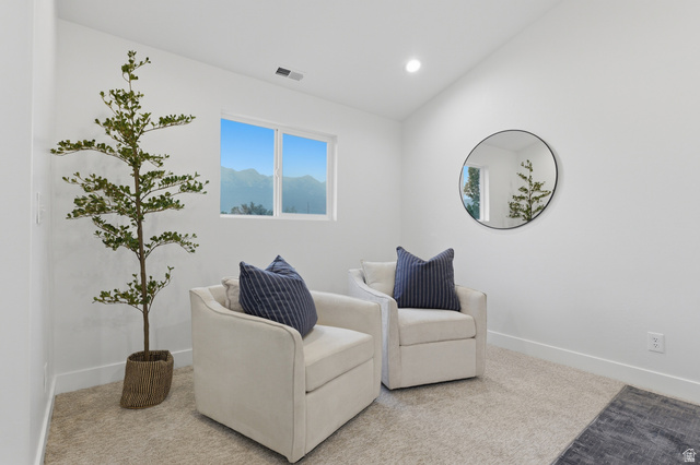 702 Alpine Highway Alpine, UT 84004 - Photo 50 of 83 Bright room featuring a window with a mountain backdrop, recessed ceiling lighting, and carpet flooring