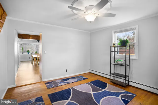 a room with furniture and wooden floor