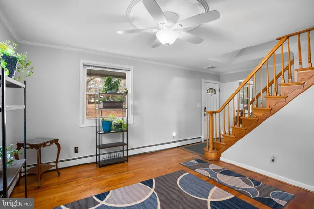 a view of room with furniture and a chandelier
