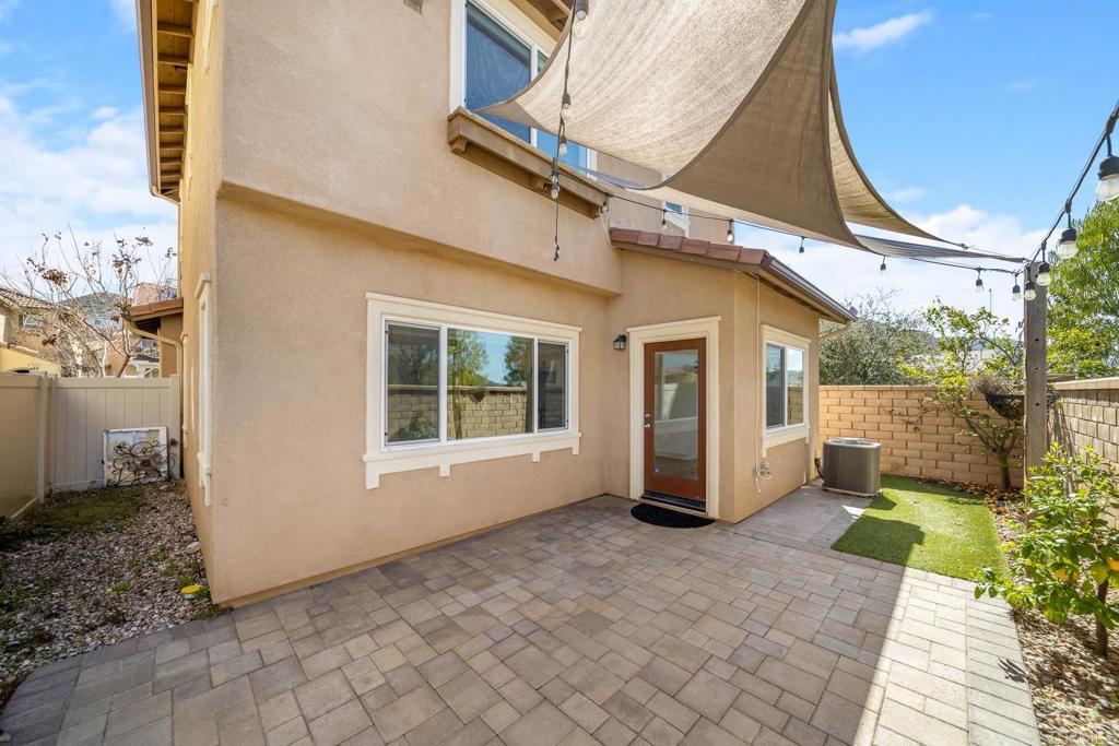 313 Dun Blazer Way Fallbrook, CA 92028 - Photo 18 of 59 a view of a house with backyard and porch