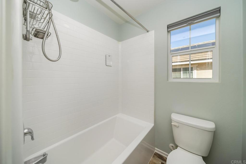 313 Dun Blazer Way Fallbrook, CA 92028 - Photo 29 of 59 a bathroom with a toilet and a shower