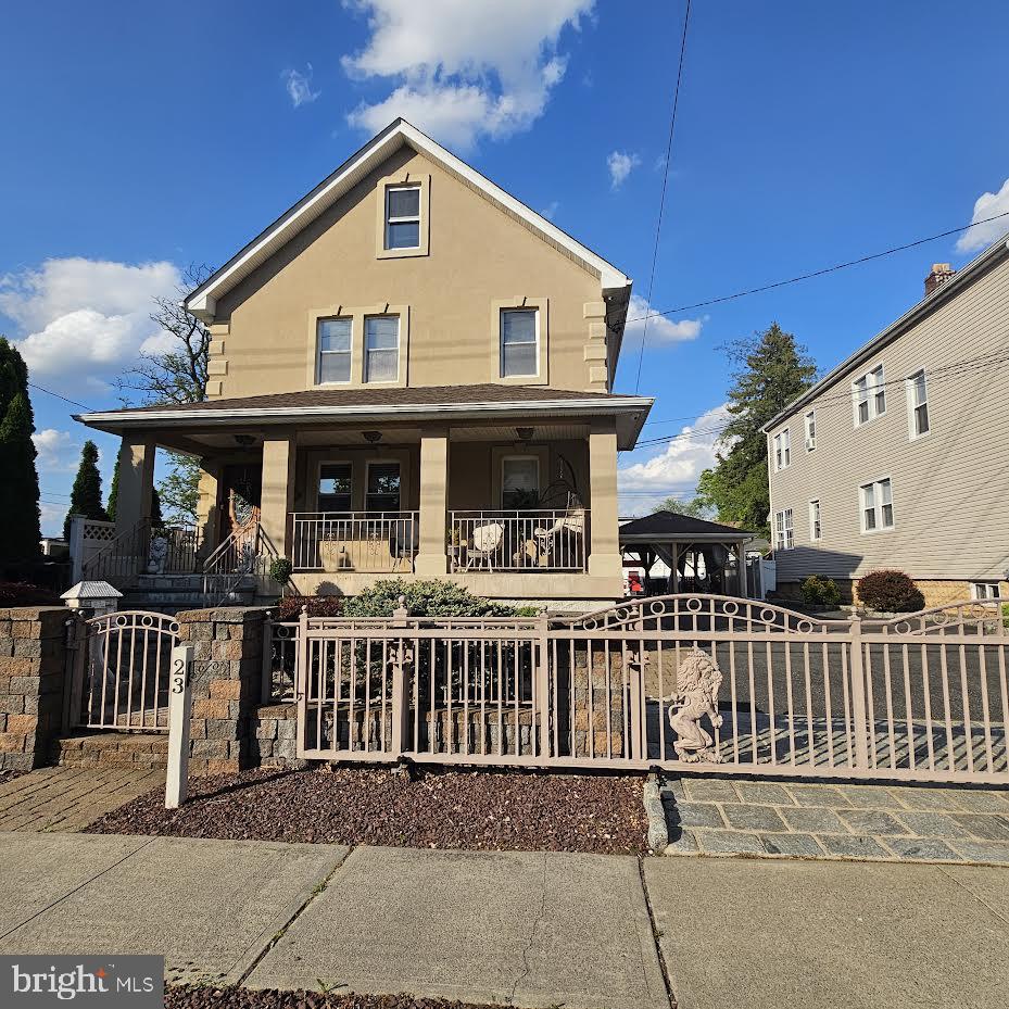 a view of a house with a roof deck