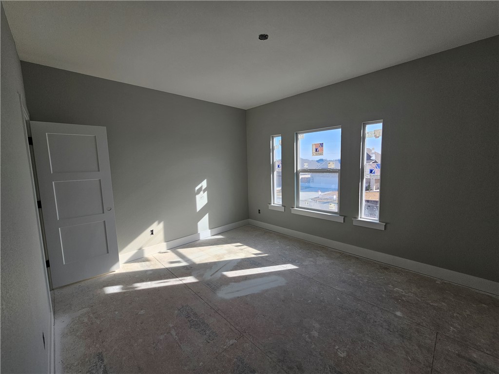 2818 Spector Drive Bryan, TX 77808 - Photo 7 of 8 a view of an empty room and window