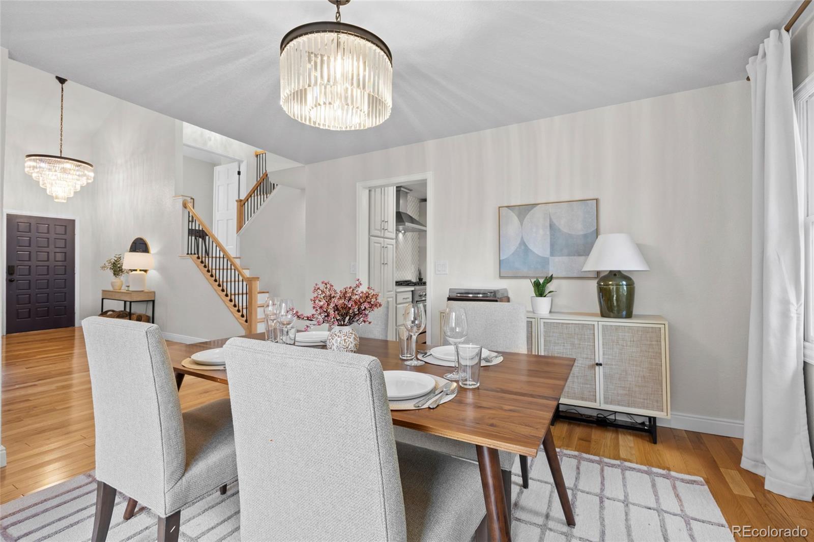 7 Red Maple Place Littleton, CO 80127 - Photo 12 of 50 a view of a dining room with furniture