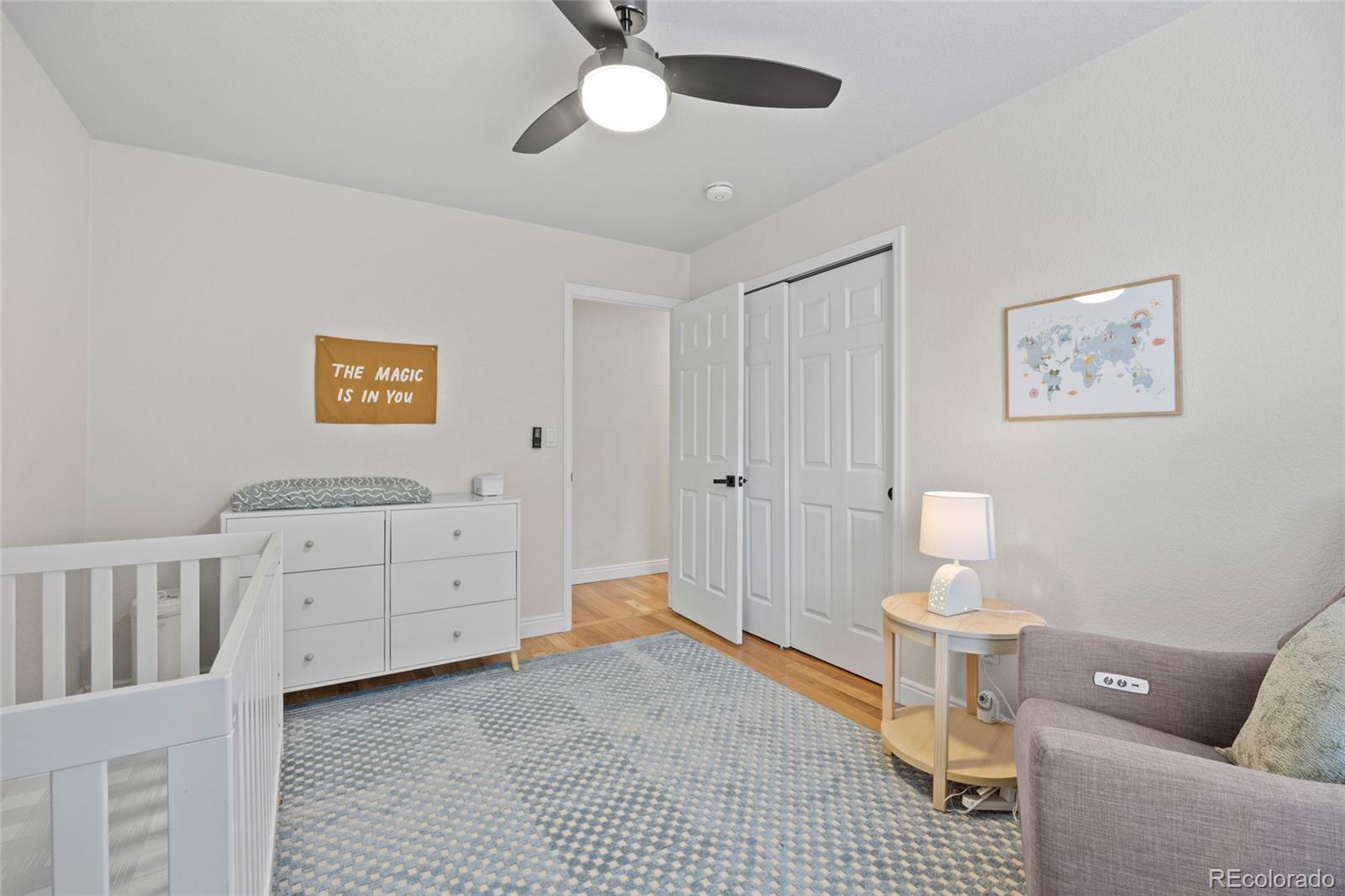 7 Red Maple Place Littleton, CO 80127 - Photo 28 of 50 a living room with furniture and a rug