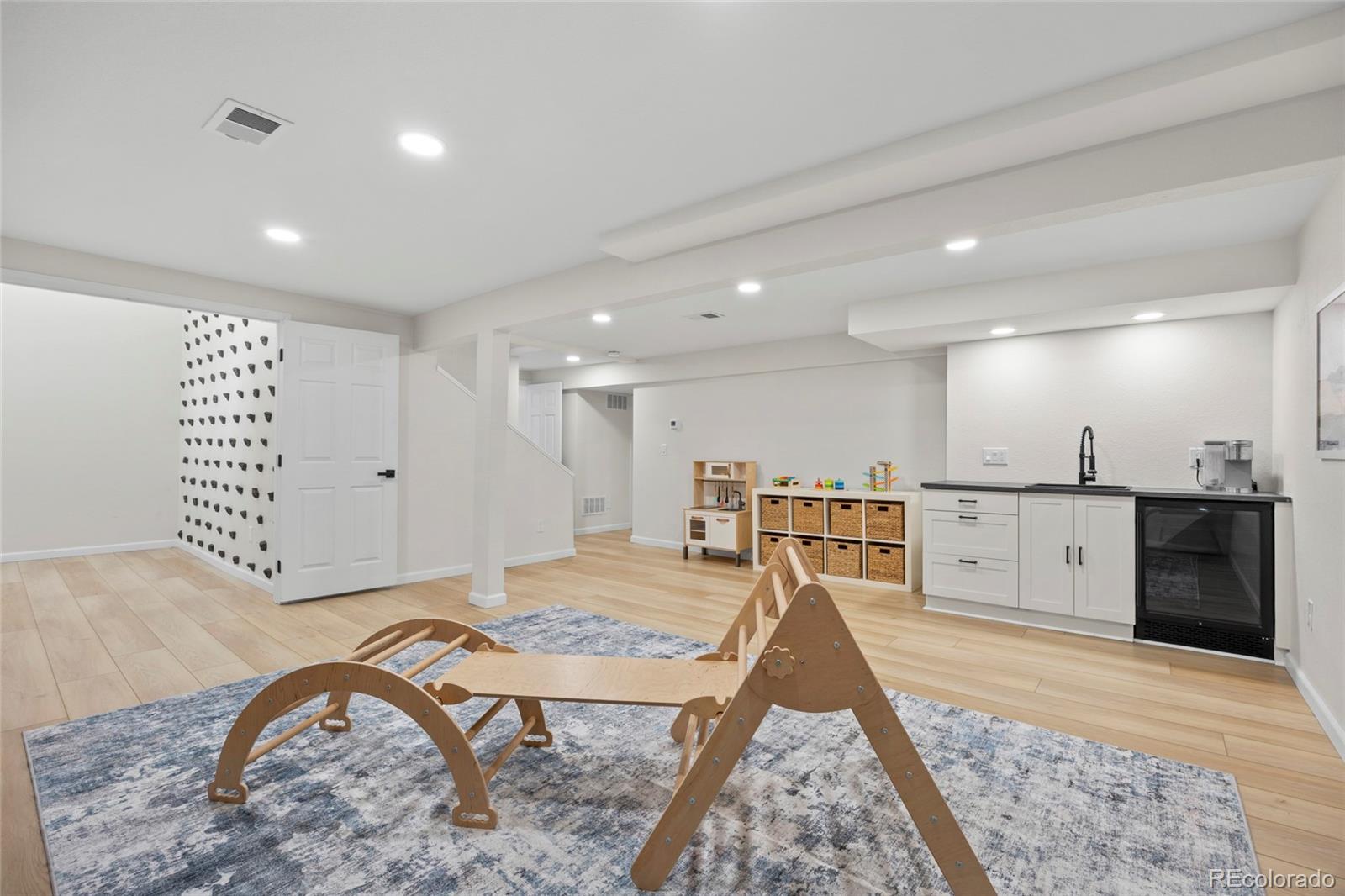 7 Red Maple Place Littleton, CO 80127 - Photo 32 of 50 a view of a kitchen and dining room