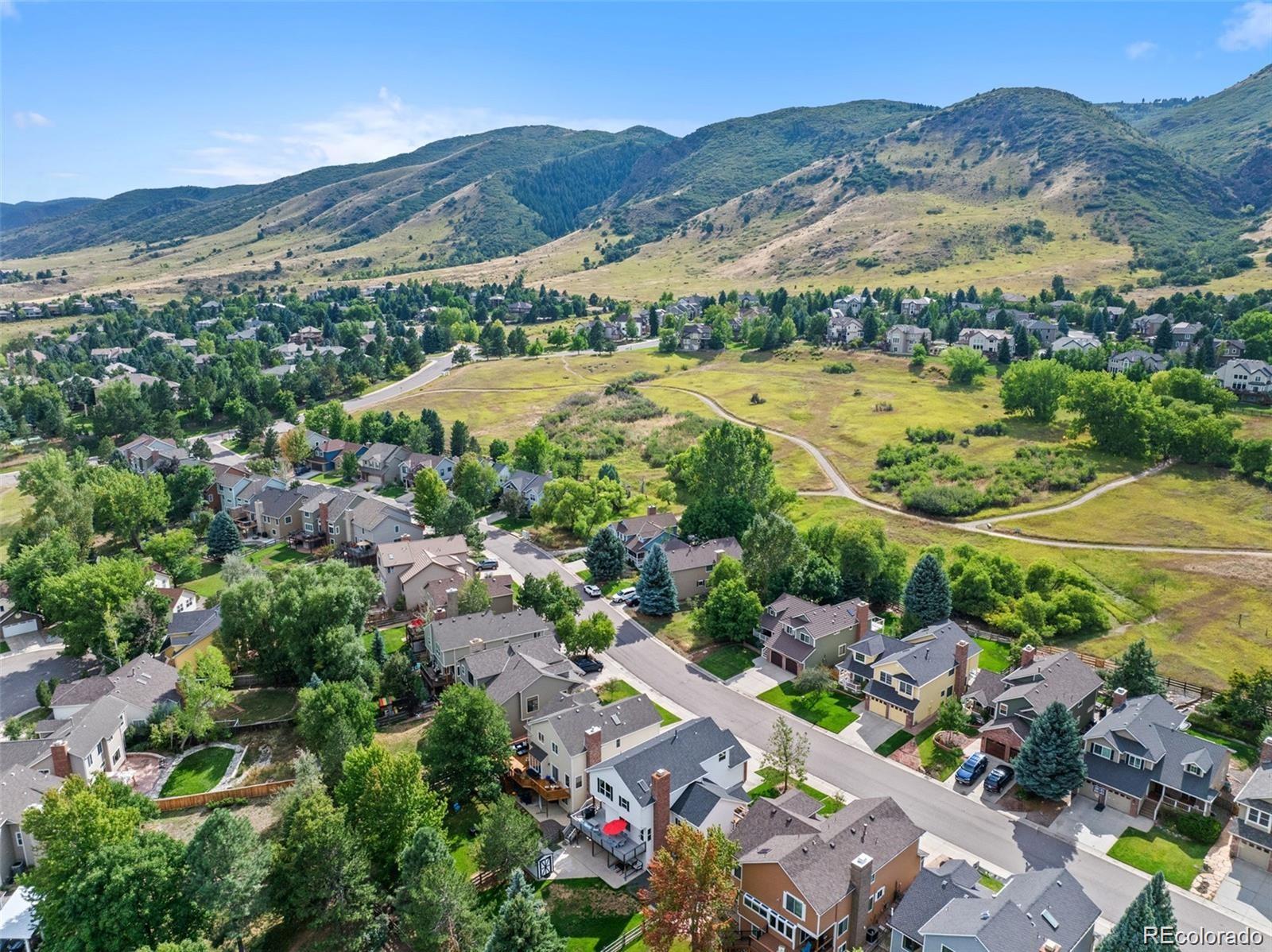 7 Red Maple Place Littleton, CO 80127 - Photo 46 of 50 an aerial view of a city with lots of residential buildings