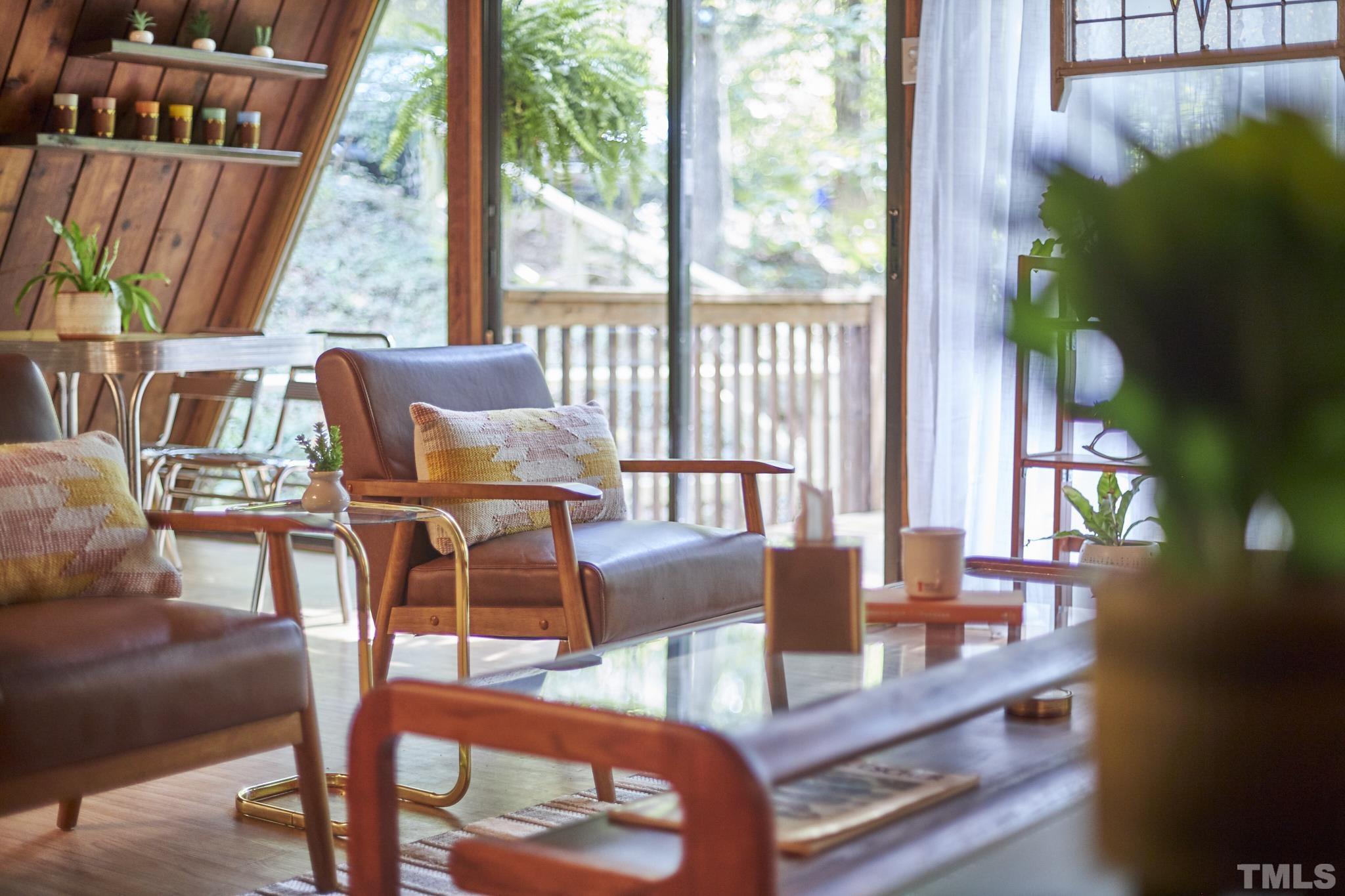 1002 Wave Road Chapel Hill, NC 27517 - Photo 11 of 43 a view of a dining room with furniture window and outside view