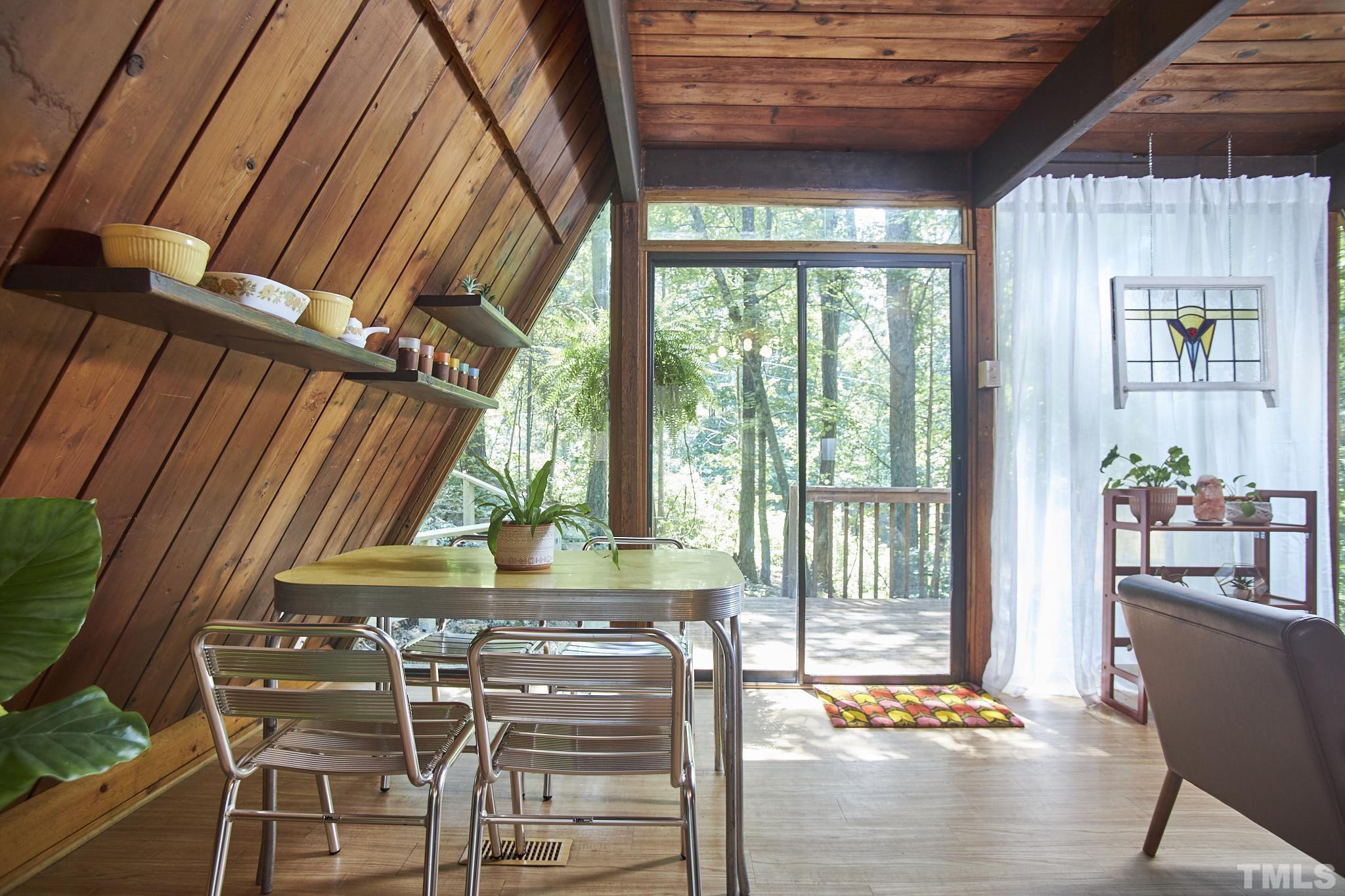 1002 Wave Road Chapel Hill, NC 27517 - Photo 18 of 43 a dining room with a table and chairs