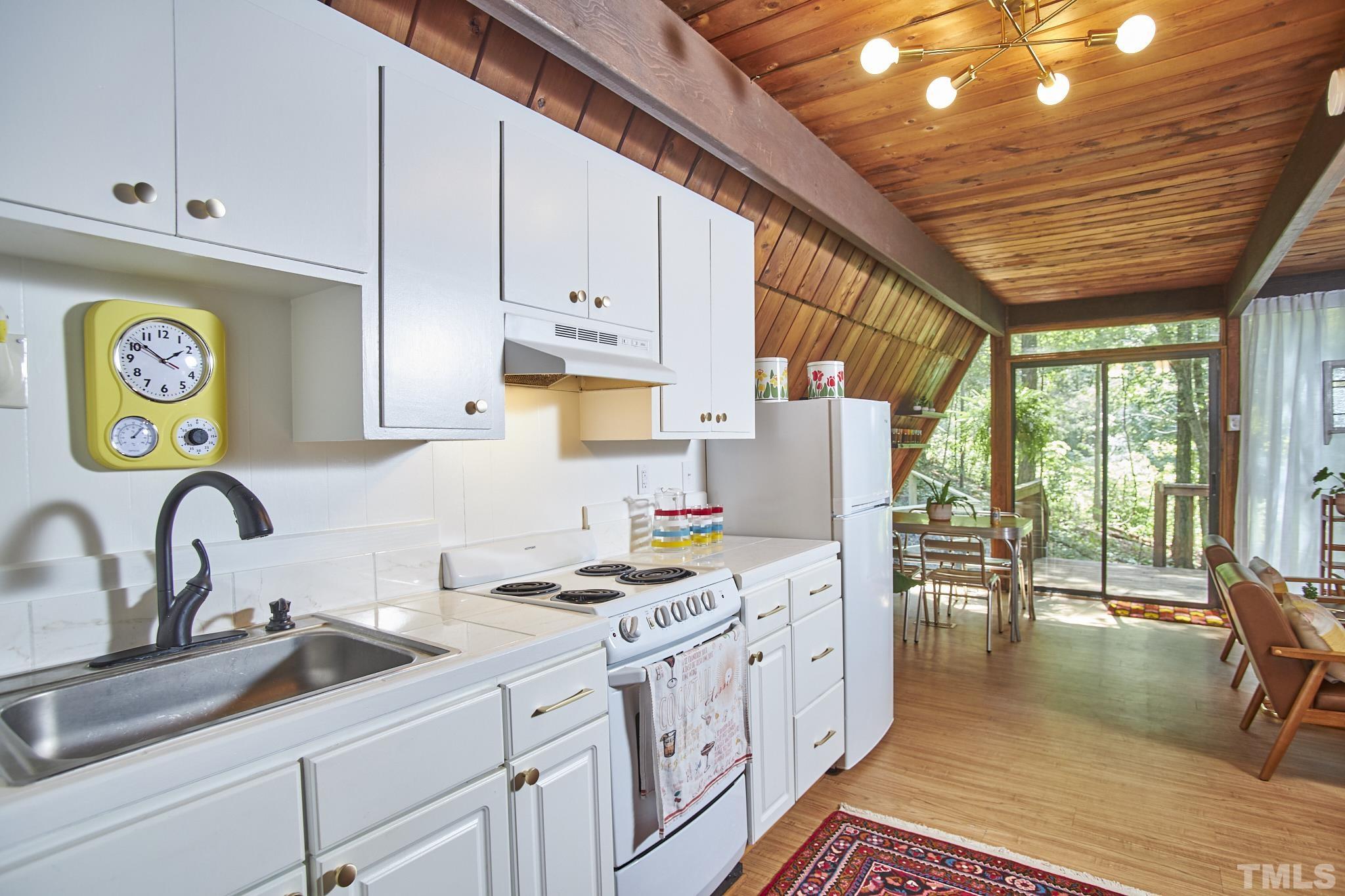 1002 Wave Road Chapel Hill, NC 27517 - Photo 20 of 43 a kitchen with lots of counter top space