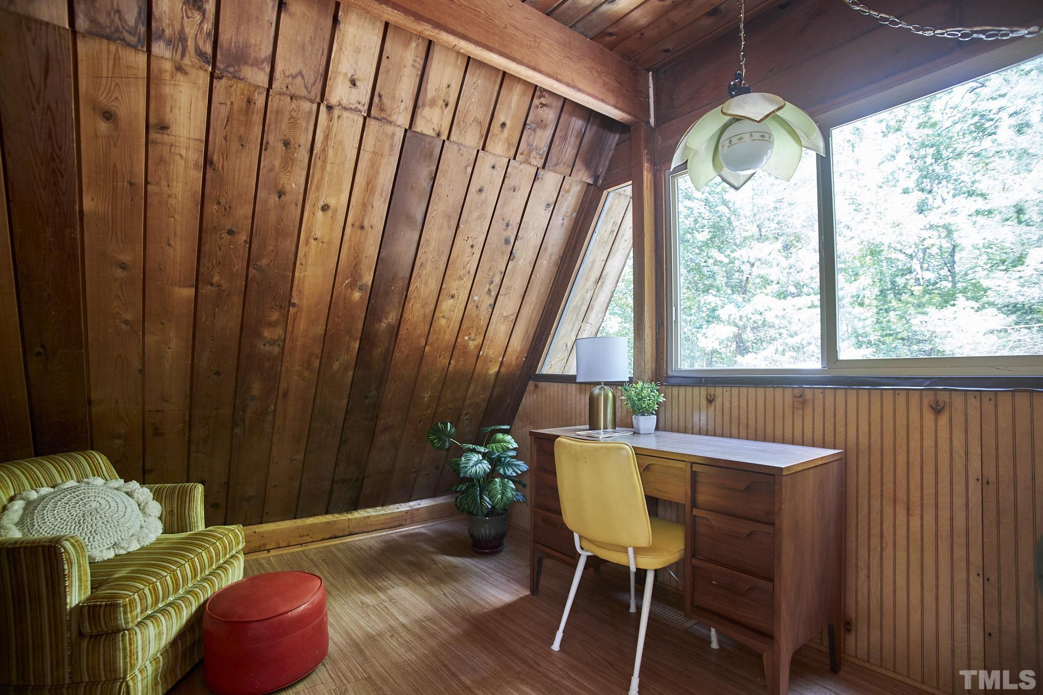 1002 Wave Road Chapel Hill, NC 27517 - Photo 25 of 43 a living room with furniture and a window