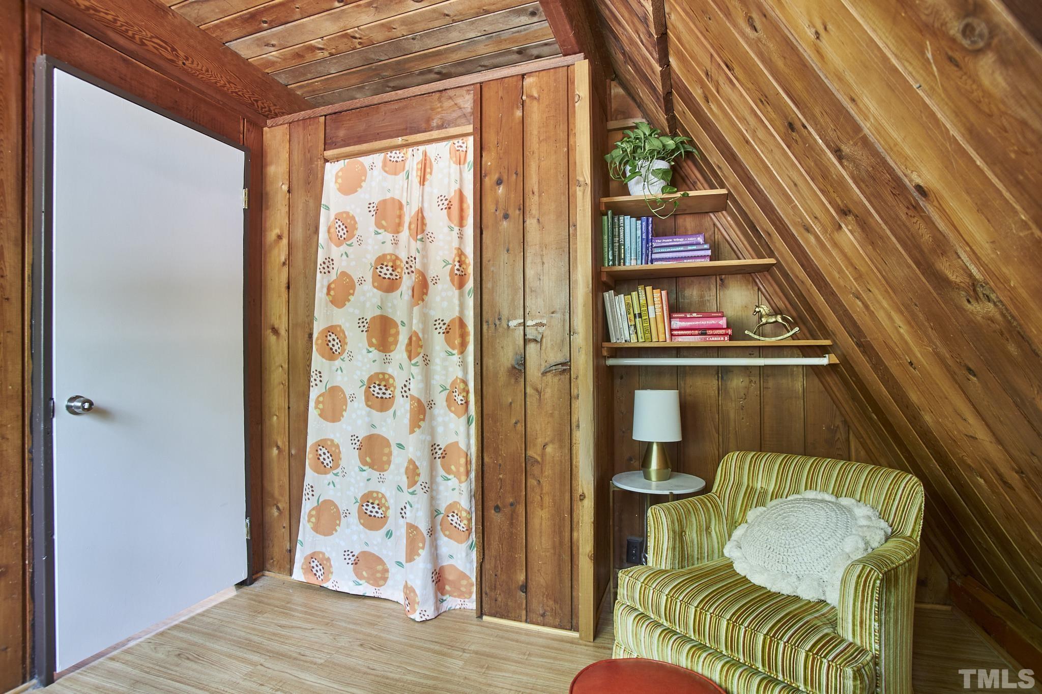 1002 Wave Road Chapel Hill, NC 27517 - Photo 28 of 43 a living room with furniture and a window