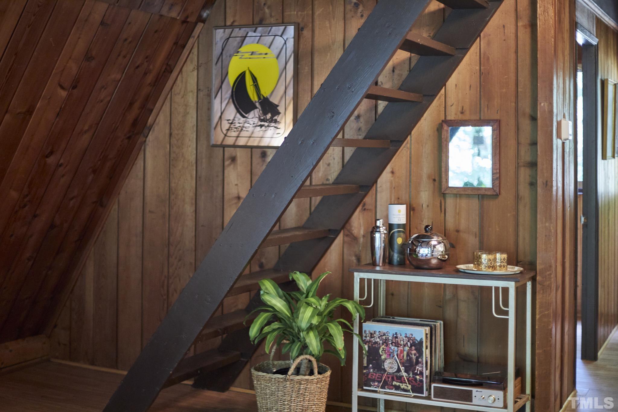 1002 Wave Road Chapel Hill, NC 27517 - Photo 30 of 43 a vase with flowers sitting on a table in front of a house