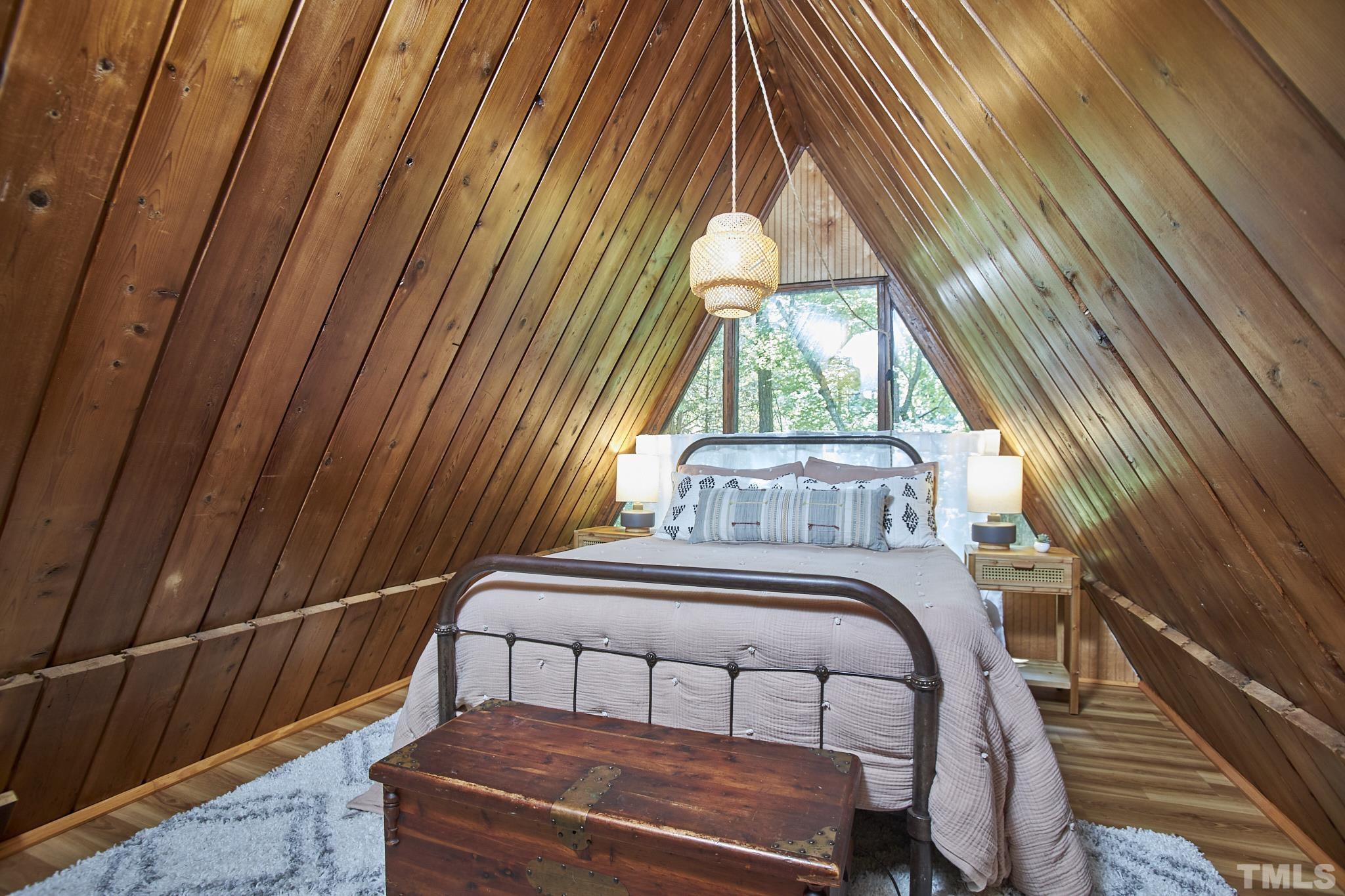 1002 Wave Road Chapel Hill, NC 27517 - Photo 31 of 43 a bedroom with a bed and a window