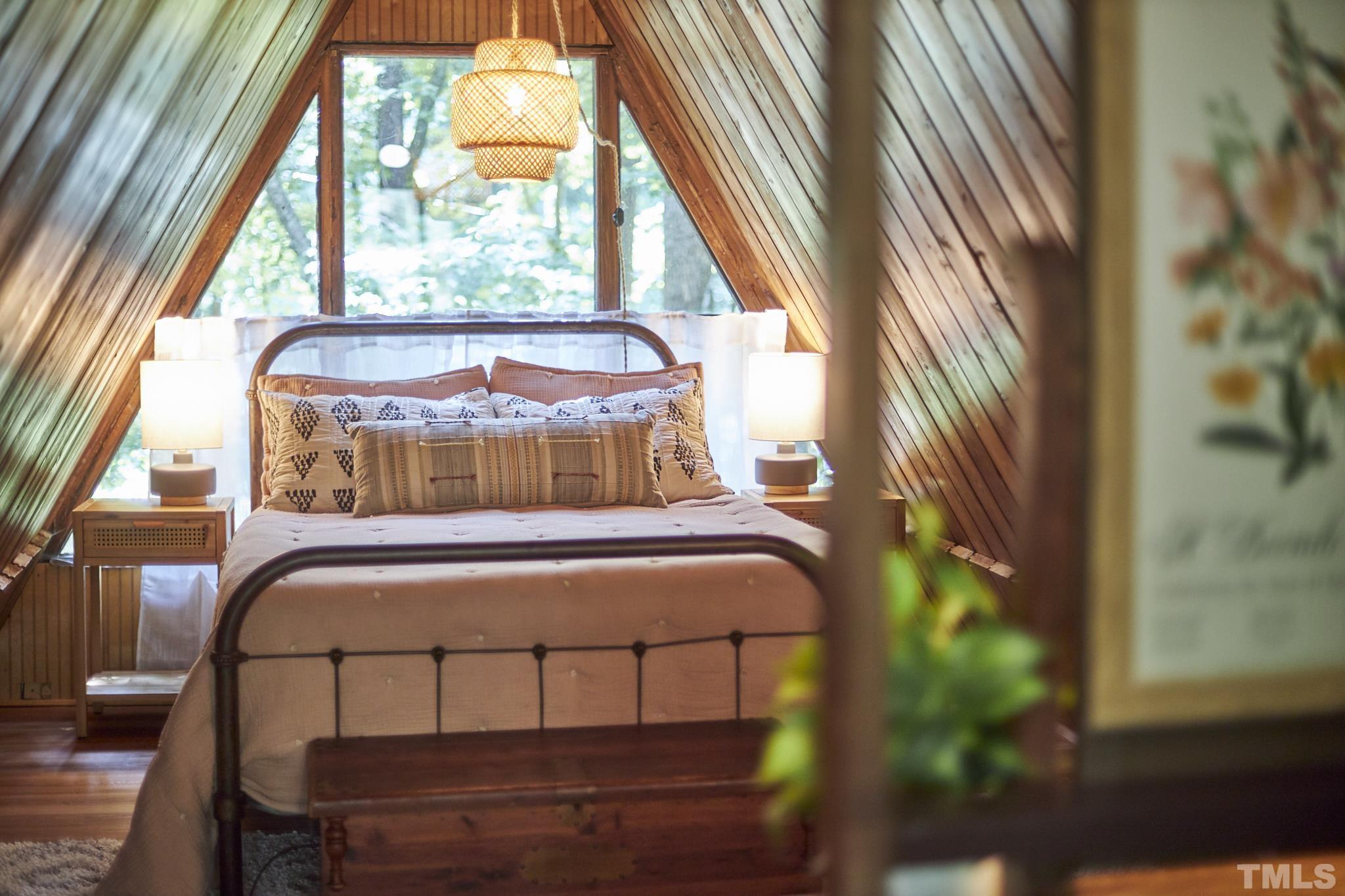 1002 Wave Road Chapel Hill, NC 27517 - Photo 33 of 43 a bedroom with a bed and a window