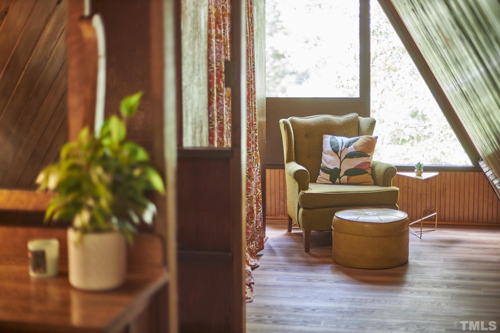 1002 Wave Road Chapel Hill, NC 27517 - Photo 35 of 43 a living room with furniture and a potted plant