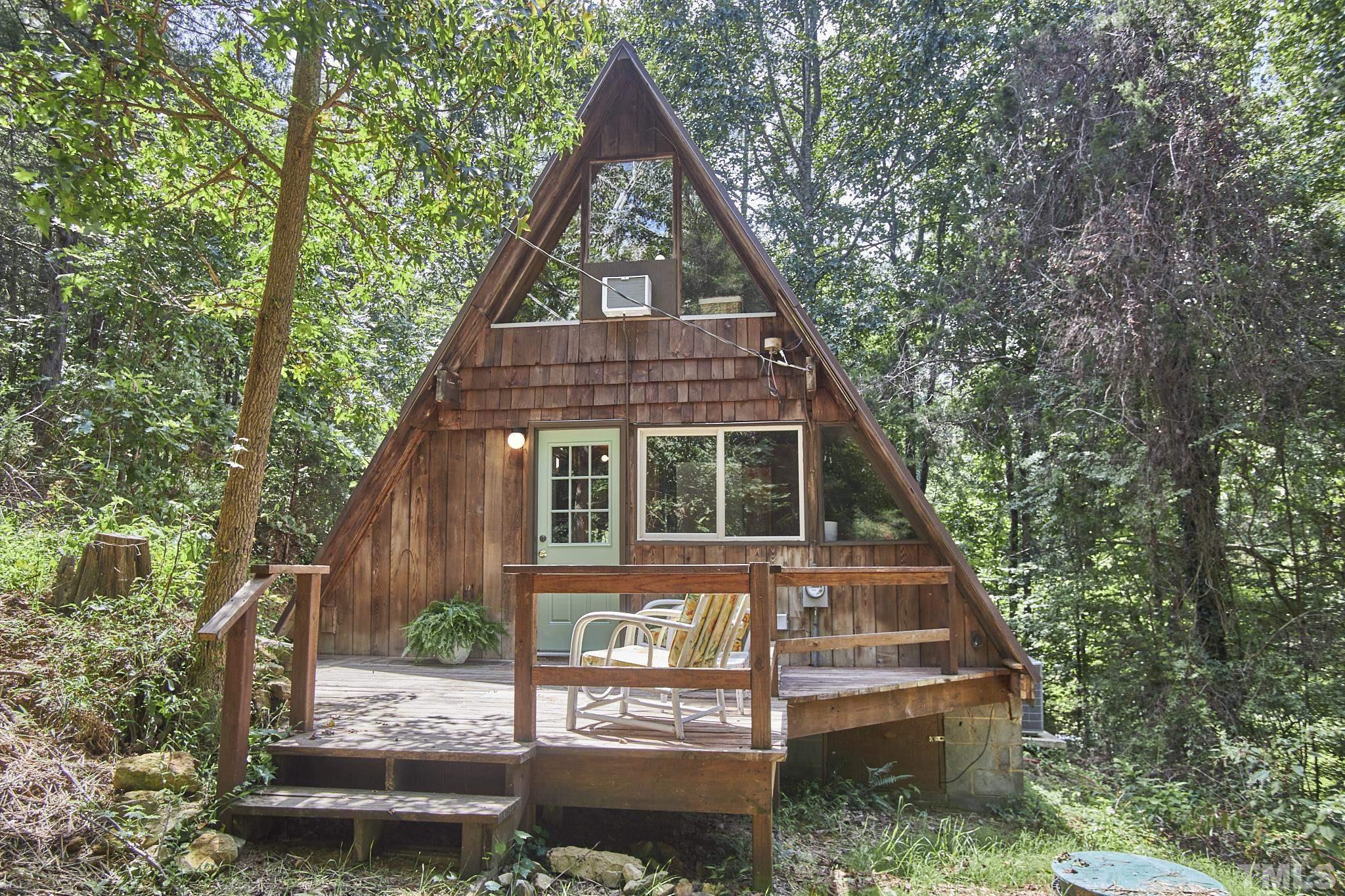 1002 Wave Road Chapel Hill, NC 27517 - Photo 36 of 43 a front view of a house with a yard