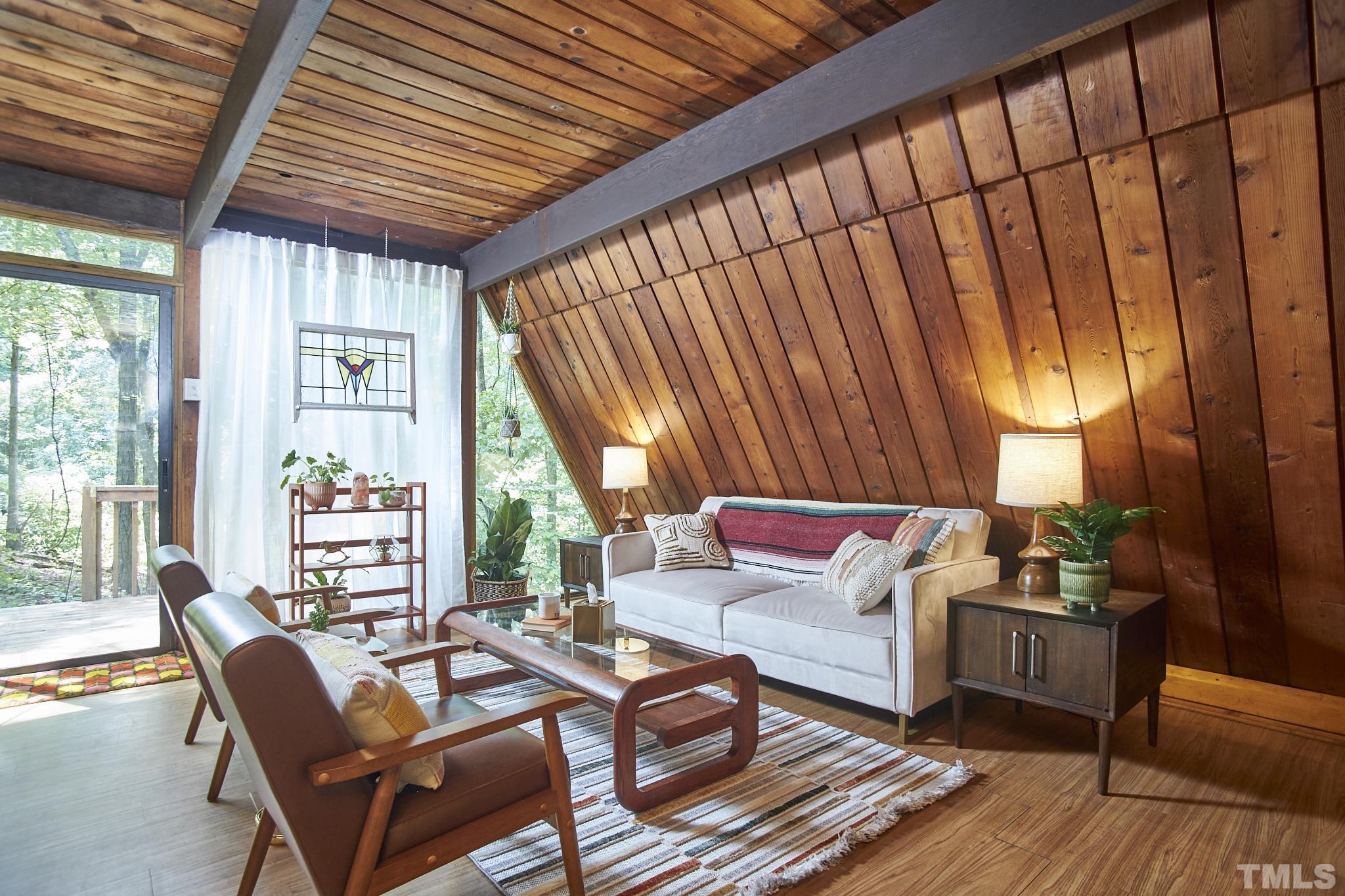 1002 Wave Road Chapel Hill, NC 27517 - Photo 8 of 43 a living room with furniture and a large window