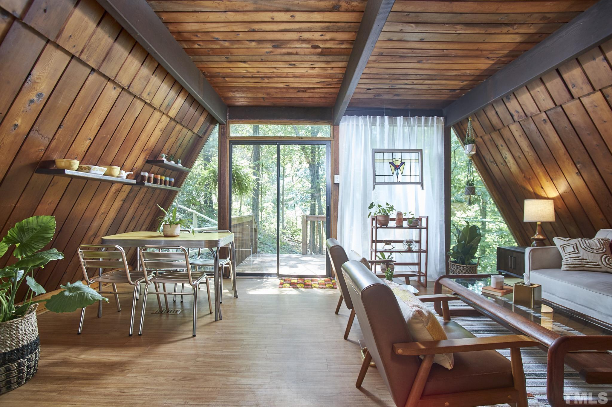 1002 Wave Road Chapel Hill, NC 27517 - Photo 9 of 43 a dining room with furniture window and outside view