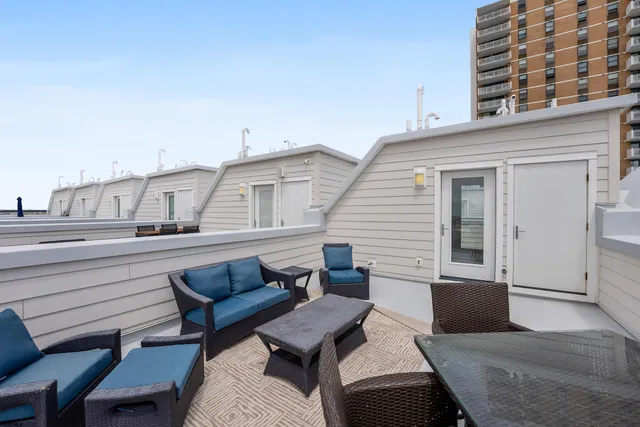 a view of a terrace with chairs