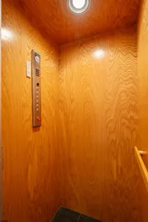 a view of a bathroom with sink and mirror