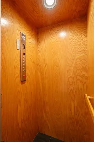 a view of a bathroom with sink and mirror