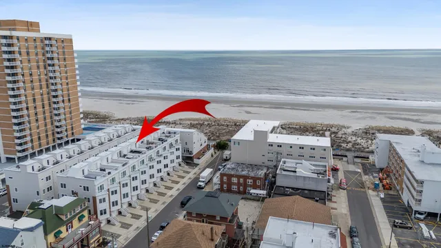 a view of roof with city view