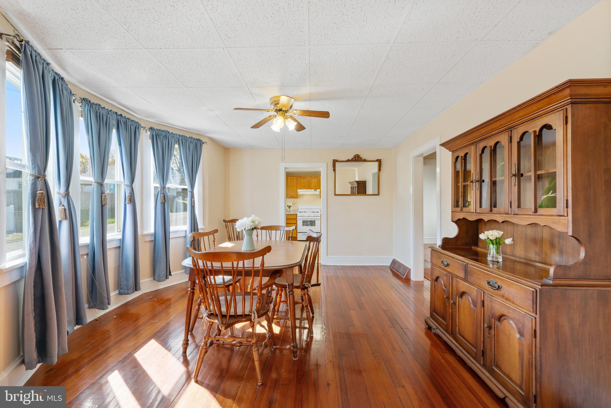 226 South Pine Avenue Maple Shade, NJ 08052 - Photo 11 of 39 a view of a dining room with furniture window and wooden floor