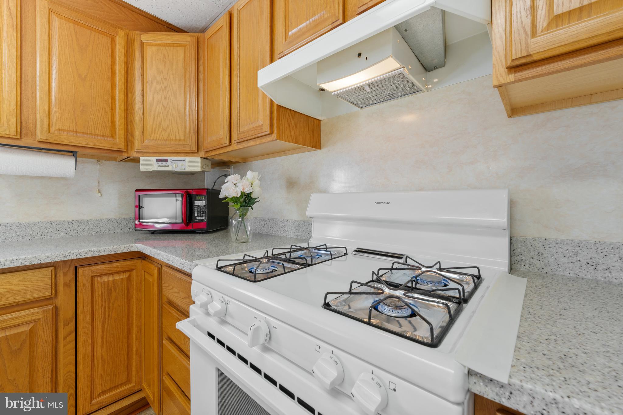 226 South Pine Avenue Maple Shade, NJ 08052 - Photo 17 of 39 a kitchen with stainless steel appliances a stove a sink and cabinets